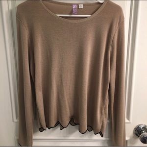 Francesca’s tan sweater with black scallop trim